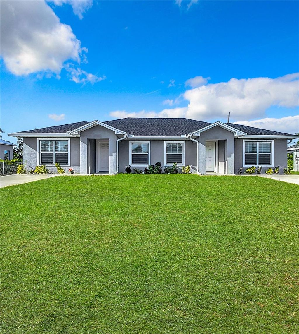 Photo of 2021 Redmond Street, Port Charlotte, FL 33948 (MLS # OM709111)