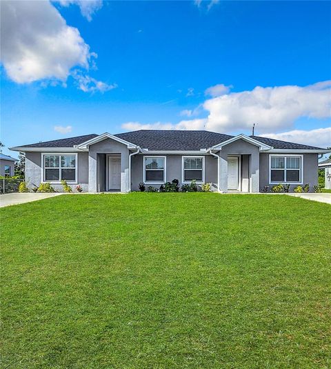 Photo of 2021 Redmond Street, Port Charlotte, FL 33948 (MLS # OM709111)