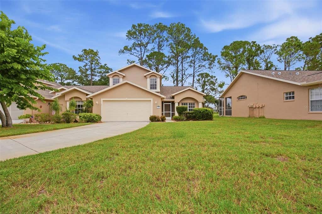 Photo of 7444 Moorgate Court, New Port Richey, FL 34654 (MLS # O6435383)