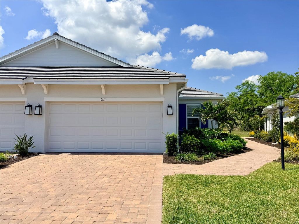 Photo of 6111 Mesa Glen Gln, Bradenton, FL 34203 (MLS # A4688499)