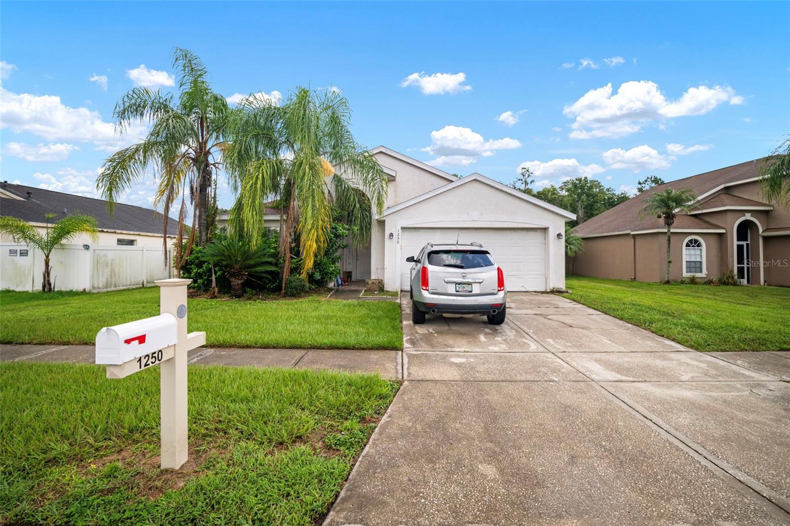 Welcome home to the peaceful suburbs of Tampa Bay! You will enjoy the best of all worlds with this home as it is in a starter home budget, has investor opportunities, and has 5 bedrooms to work for even growing families and non-first time buyers! The open floorpan offers a kitchen open to the dining and living space, and a cozy fireplace to be enjoyed in the gorgeous Florida winters. The gorgeous tile throughout is ideal for easy cleaning and offers consistency throughout the home. The primary suite includes both an oversized garden tub as well as a walk-in shower and dual sinks! The bedroom at the front of the home makes for a perfect office space with 4 windows panning the front perimeter of the home and offering ample sunlight inside. Two of the bedrooms share a bathroom as a jack and Jill and one side has a sliding door offering perfect convenience and efficiency of the space. The fully fenced yard is very generously sized, and includes a covered screen porch to enjoy any time of the year. This home truly has it all, and is in the heart of it all. Come see it today!