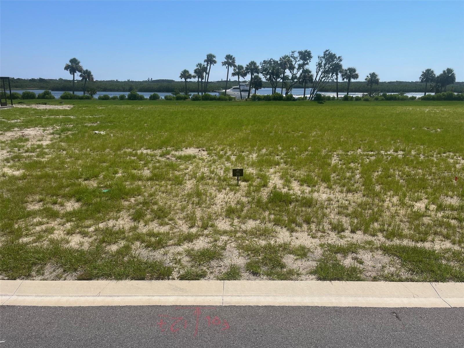 DIRECT INTERCOASTAL WATERFRONT HOME SITE LOCATED IN THE NEW LUXURIOUS VERANDA BAY COMMUNITY IN FLAGLER BEACH!! High and dry 50X130 lot cleared and filled and ready to be built on. This gated community offers amenities that include: Resort style pool, tennis and pickleball courts, fitness center and even a dog park. The wet slip marina will accommodate your boat or you can choose to build your own shared dock with your next door neighbor. The preferred builder program offers 4 choices of the best custom builders in the region. Veranda Bay is minutes from the charming town of Flagler Beach which offers fine and casual dining. The new Compass Hotel with a Jimmy Buffet Margarita theme has a tiki bar, rooftop terrace and new restaurant right in the heart of Flagler Beach. Veranda Bay has easy access to Daytona, St. Augustine, Jasonville and Orlando. Come watch the boats and dolphins go by as you enjoy your Intercoastal waterfront home! Owner is a licensed R.E. Broker Associate.