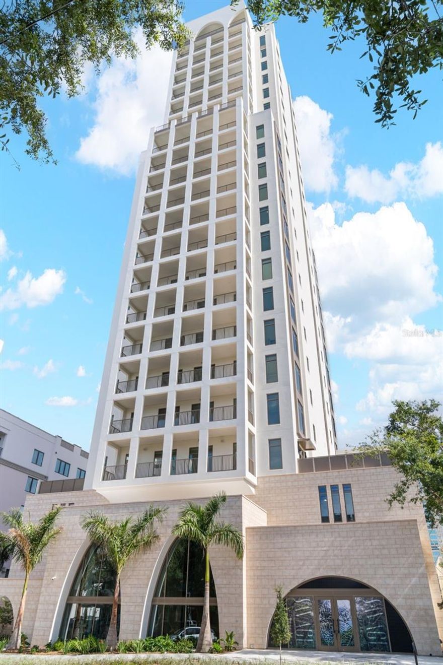 One or more photo(s) has been virtually staged. Now complete and move-in ready, this full floor home at The Nolen St. Pete offers an exceptional blend of luxury, privacy, and design within a 23-story boutique tower of only 31 residences. The elevator opens directly into a spacious foyer with a storage closet and double-door entry revealing breathtaking views of Old Northeast, Tampa Bay, and the Vinoy Basin. The chef’s kitchen is equipped with Gaggenau appliances, an induction cooktop, double ovens with convection microwave, a Blanco sink, two refrigerators, two freezers with ice makers, a large wine fridge, and an expansive waterfall island with quartz countertops and abundant pantry space. The open living area flows seamlessly to a 38-foot terrace that spans from the living room as well as a second terrace on the south side spanning the primary suite, showcasing sunrise and sunset views. The primary suite offers a spa-inspired bath with a soaking tub, walk-in shower with rain head and bench, dual vanities with LED illuminated mirrors, a makeup station, and an expansive walk-in closet. Both guest bedrooms feature en-suite baths, one guest room featuring terrace access. Additional highlights include a bonus study, powder bath, large laundry room with extra cabinetry, and generous storage throughout. Enjoy resort-style amenities including a saltwater pool and spa, fitness center, club lounge, fire pit area, outdoor grill space, and concierge service. The residence includes a private two-car garage within the parking structure and climate-controlled storage unit with its own mini-split AC. This is your opportunity to own a brand-new, never-lived-in residence at one of downtown St Pete's best locations. The Nolen is a thoughtfully designed, NGBS-certified green building, offering an elevated, maintenance-free lifestyle just steps from Beach Drive, waterfront parks, marinas, and downtown’s best dining and shopping. A new award-winning coffee shop is now open on the ground level — making it easier than ever to enjoy your morning routine or unwind just an elevator ride away. At The Nolen, downtown is downstairs — with the city’s finest restaurants, culture, fitness studios, and entertainment all within walking distance. The Nolen #2001 perfectly blends modern elegance, thoughtful design, and the timeless charm of St. Petersburg’s waterfront lifestyle. Come and view it today!