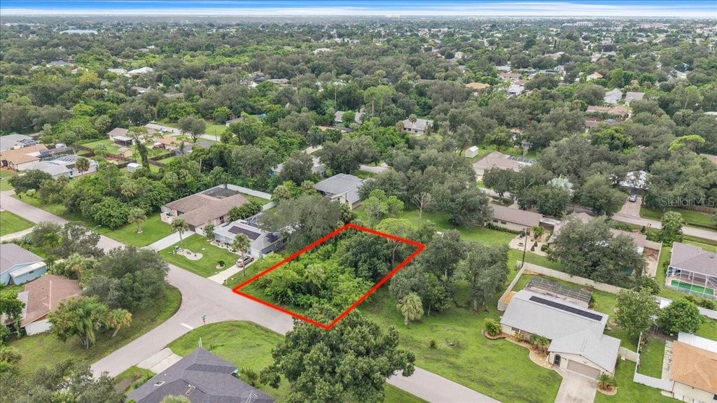 Photo of 21253 Wardell Avenue, Port Charlotte, FL 33952 (MLS # C7531113)