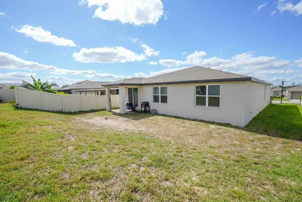 Photo of 877 Cambridge Drive, Winter Haven, FL 33881 (MLS # O6353088)