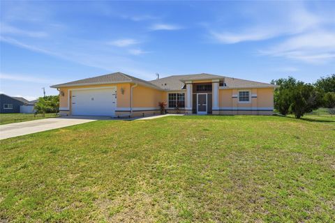 Photo of 928 NW 5th Place, Cape Coral, FL 33993 (MLS # TB8503379)