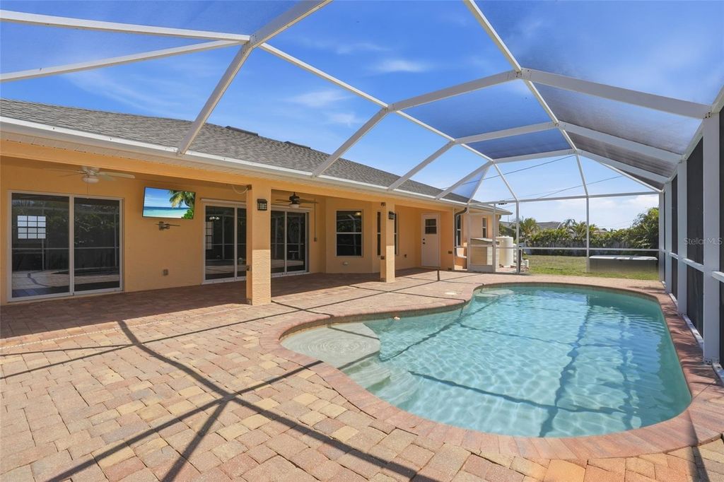 Photo of 928 NW 5th Place, Cape Coral, FL 33993 (MLS # TB8503379)