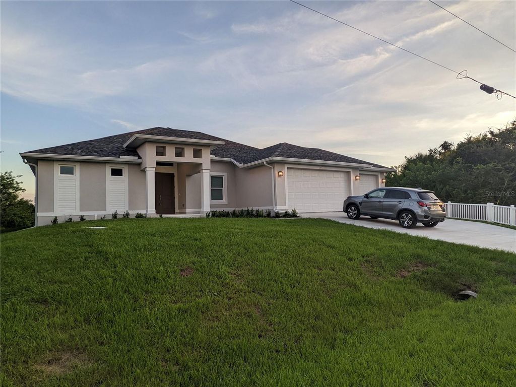 Photo of 13305 Longville Avenue, Port Charlotte, FL 33981 (MLS # C7524119)