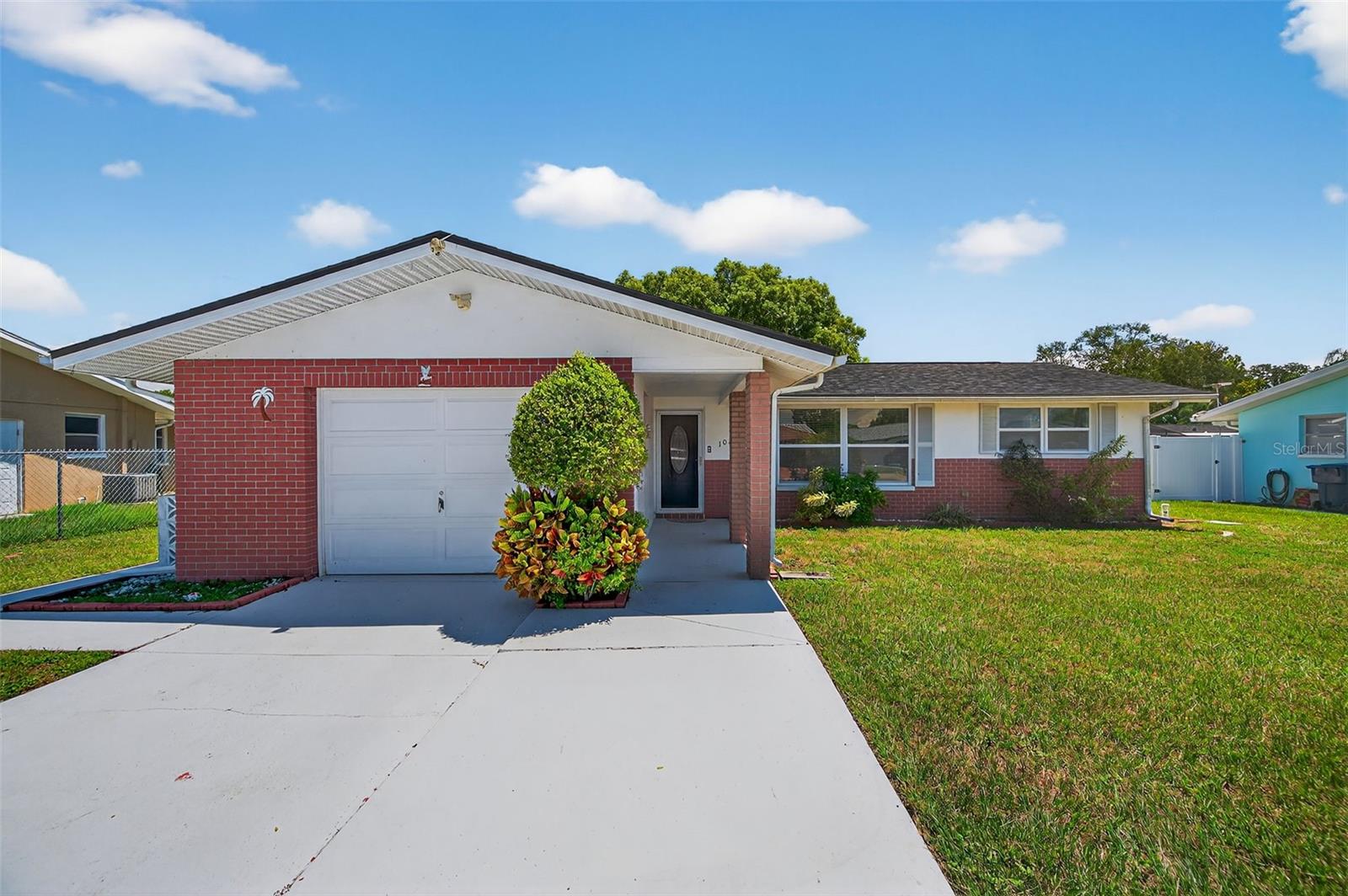 Welcome to your beautifully remodeled Florida home! This 2-bedroom, 2-bathroom property features a versatile bonus room that can easily serve as a 3rd bedroom, plus a 1-car garage. With a new roof (2024) and no flood insurance required, this block home is truly move-in ready! Inside, you’ll love the modern kitchen with upgraded cabinetry, stone countertops, and stainless appliances, along with two spa-like bathrooms. The home also includes luxury vinyl plank flooring, fresh paint, updated plumbing, electrical, and six-panel doors. Step out to the bright Florida room leading to a fenced backyard, perfect for relaxing or entertaining. Additional perks include an irrigation system and newer windows. Conveniently located close to shopping, dining, and schools. Don’t miss your opportunity to own this piece of paradise -- schedule your showing today!