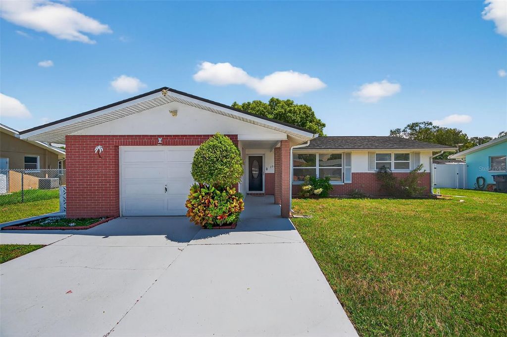 Photo of 10404 Loquat Drive, Port Richey, FL 34668 (MLS # TB8420356)
