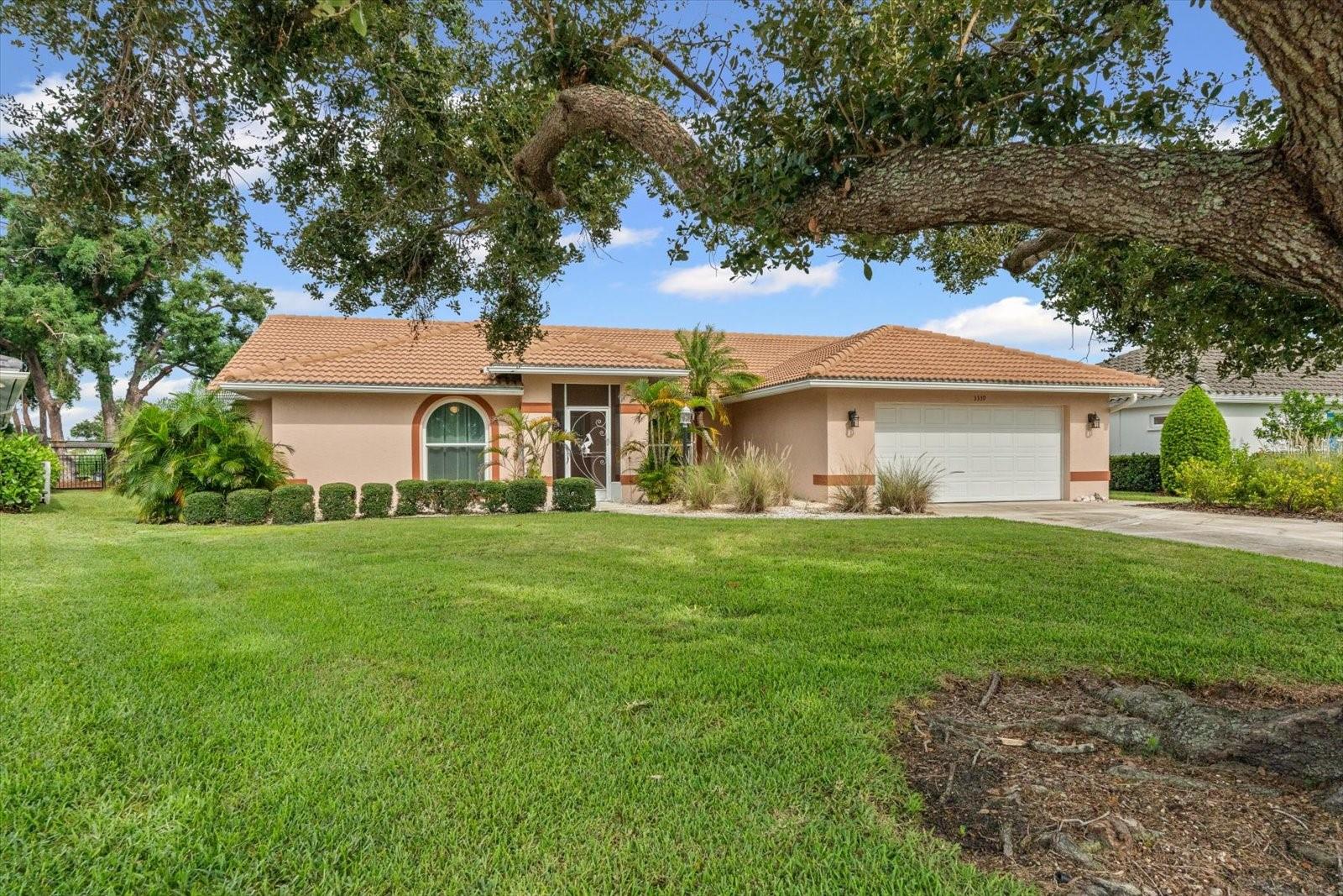 Welcome to the highly desirable neighborhood of Village Green Estate! This 4 bed 4 bath home sits on one of the best lots offering a beautiful private panoramic view of the golf coarse! The home is truly move in ready and extremely well maintained with major recent upgrades including, hurricane impact windows(2025), new tile roof(2018), and HVAC system(2024)! Village Green Estates offers the nearby golf clubhouse, NO CDD Fees, plus SUPER low $100 Annual HOA Fees! This is a Fabulous Location close to Everything - Publix Grocery Store, Walmart, Walgreens, Starbucks, Legacy Bike Trail, Downtown Sarasota, I-75, UTC Mall, and the Siesta Key! This west facing home also features both front and back screened patios, newer brick paver patio/sidewalks, and triple pocket sliding doors!