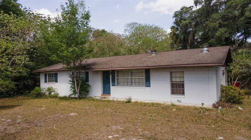 Located directly on US Hwy 301 with 180’ of road frontage this property is ready for your business venture.  Comprised of 1+/- acre with over 1,500 total square feet, his property is prime for Commercial use. Constructed of block this home features 3BR/2BA and is perfect for an office renovation.  Surrounding properties consist of residential, commercial retail, commercial office, landscape nursery, self-storage and RV storage.  This site is nicely squared with approximate dimensions of 180’w x 185’d.  Sitting due West & North of The Villages’ newest expansions, “Fenney, Southern Oaks, and Middleton” this location is PRIME for your business with easy access to The Villages, The Florida Turnpike, I-75, and CR 470. Give me a call today and let’s start renovating tomorrow!