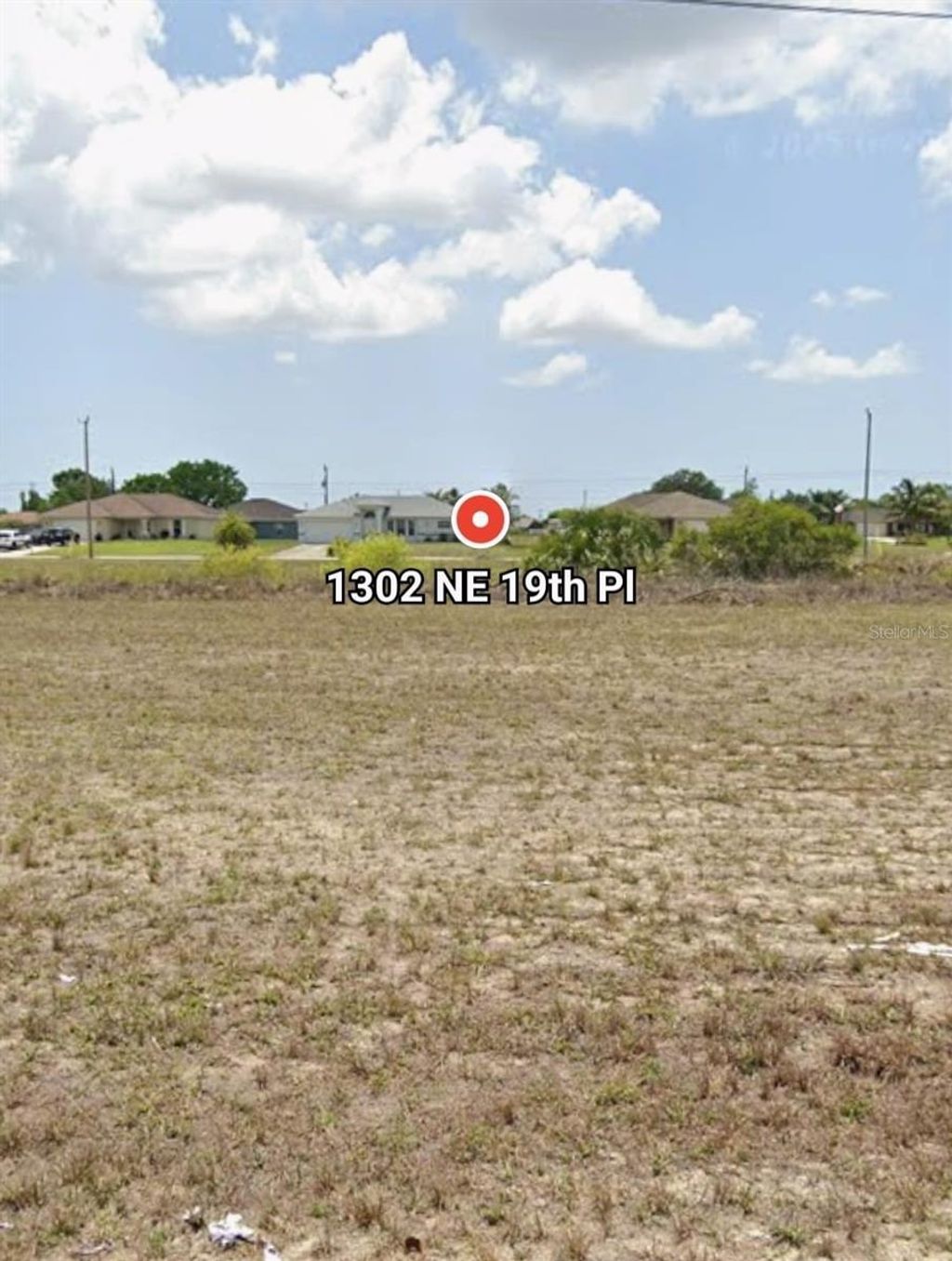 Photo of 1302 NE 19th Place, Cape Coral, FL 33909 (MLS # O6366248)