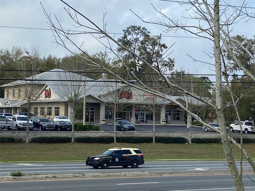 Retail space for lease on NW HWY 441 in Alachua! Minutes from I75, close and convenient to Gainesville and surrounding areas. Great signage, open floor plan, and plenty of parking! This suite is ready to be customized to your business. Come join other tenants such as: Moe's Southwest Grill, South Beach Tanning Company, One Stop Medical and Urgent Care, Dominoes, TB Goods, Life South Community Blood Center and two new restaurants to be announced soon! Lease rate is based upon a 5 year lease.