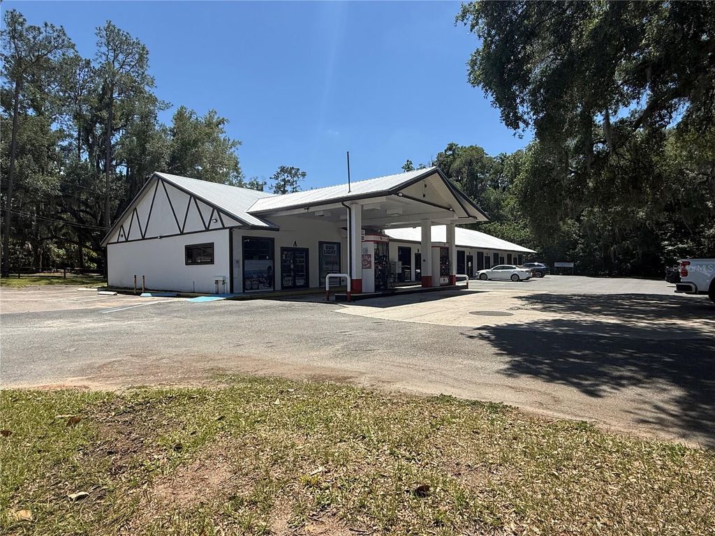 Photo of 3380 SE Lake Weir Avenue #F, Ocala, FL 34471 (MLS # OM724358)