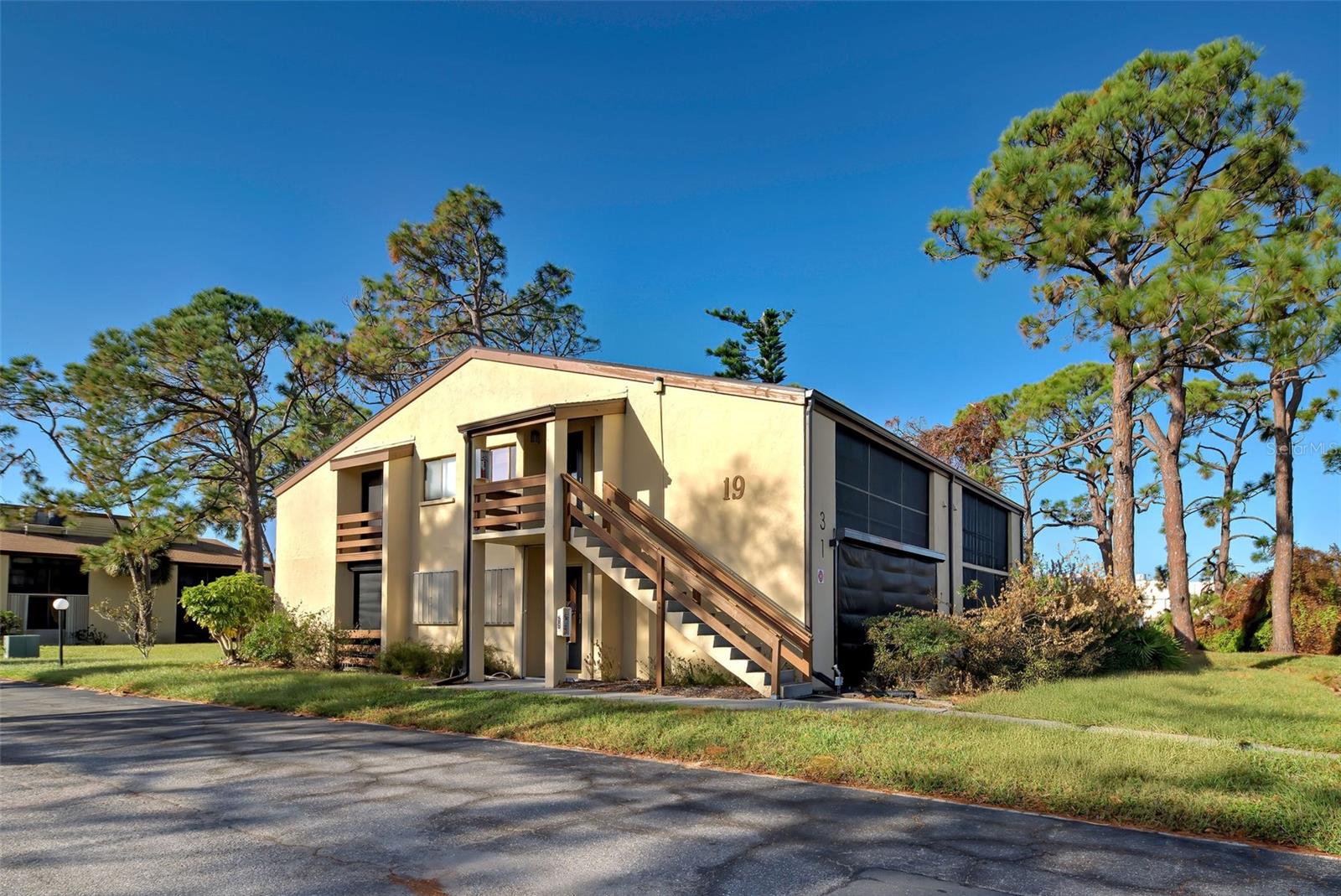 EXCELLENT VALUE IN THIS GROUND FLOOR CORNER UNIT IN QUIALS RUN. THIS IS A QUAD UNIT - HARD TO COME BY! ONE OF THE LARGER UNITS IN QUAILS RUN WITH 2 BEDROOMS - 2 FULL BATHROOMS. These quad units are unique is size and provision of your own laundry hook up! New AC in 2022 - New hot water heater in 2024. The building roof replacement was 2023.
You will be delighted with the 108 square foot all-weather front lanai with glass sliders leading into the unit. Storage at one end and your laundry closet at the other.
The primary bedroom has its own ensuite bathroom with step-in shower. walk-in closet and a cozy private enclosed patio space to hide away with a good book or an afternoon nap. This area would also make a good hobby room. The living room and dining area are bright and airy. Open the two sets of sliding glass doors to increase your living space. Big enough to host that dinner party or those Sunday Football Games!
You will appreciate the privacy of this location, yet just a few steps from the Pool Area, Clubhouse and your Private Mailbox. This community has a tranquil design with lots of greenspace and water features. Only minutes away from Dearborn Street - The Central Hub of Englewood where you can find great restaurants, live music, social clubs, craft coffee shops, specialty stores, clothing boutiques, hair salons, yoga studio, art galleries and more.
THIS CONDO HAS BEEN WELL MAINTAINED AND MOVE IN READY. BEING SOLD FURNISHED AS IS. MAKE THIS YOUR NEXT MOVE - SCHEDULE AN APPOINTMENT NOW TO SEE THIS LOVELY UNIT.