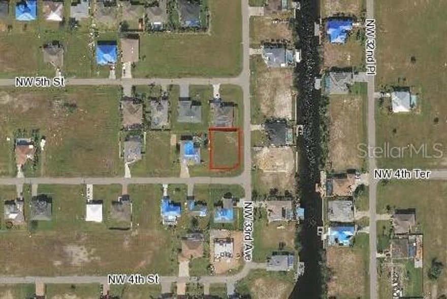 Beautiful vacant lot in Cape Coral. Come and build your home in this lovely neighborhood on 0.25-acre land without association fees! Invest in FL!!
