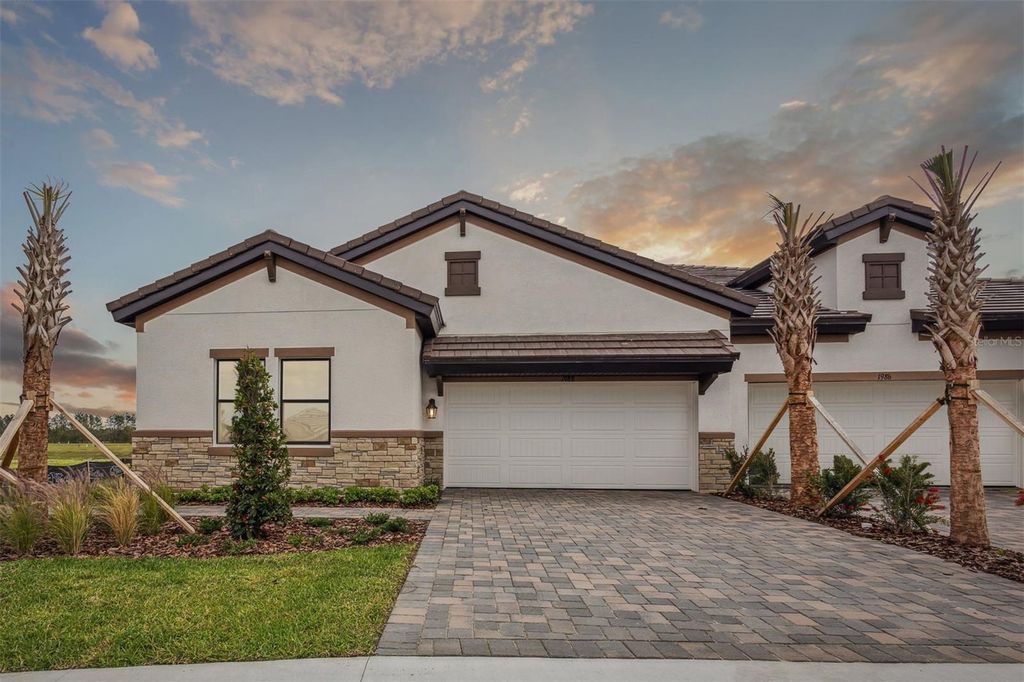 Photo of 1988 Webbstone Way, Zephyrhills, FL 33541 (MLS # TB8360461)