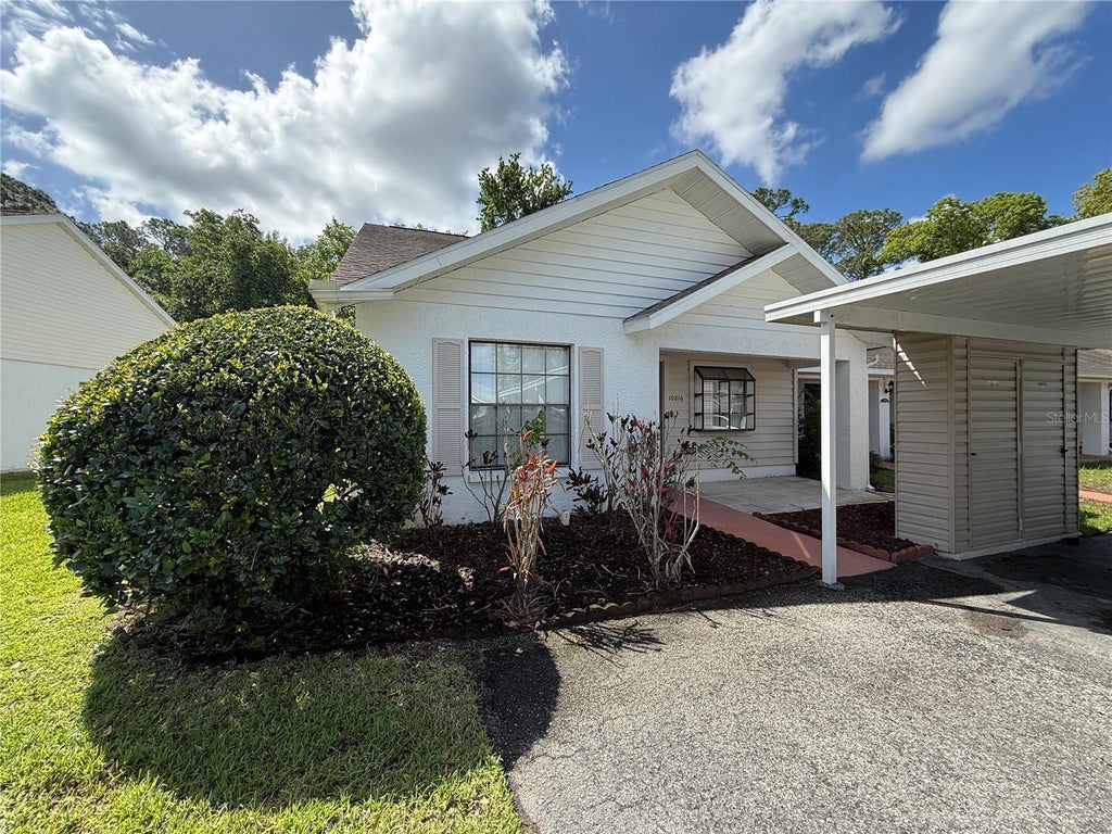 Photo of 10816 Laquinta Drive, New Port Richey, FL 34654 (MLS # TB8554685)
