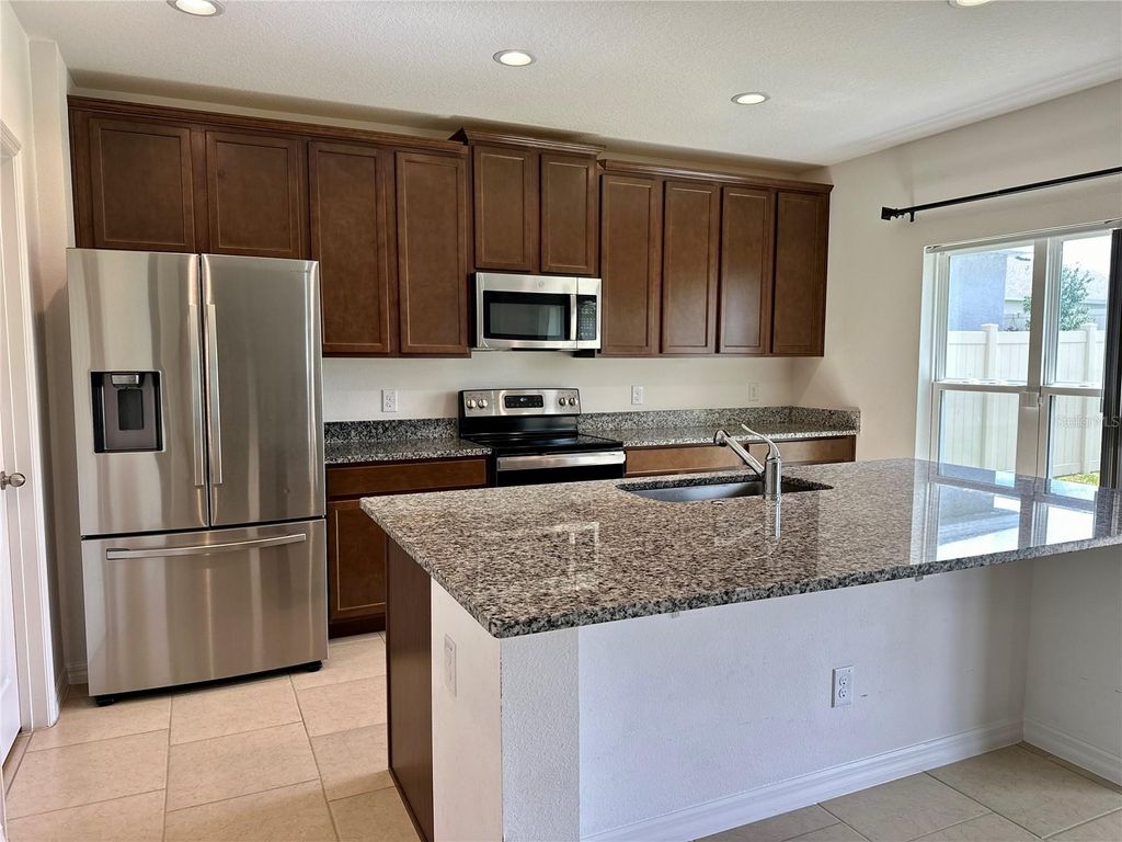 Photo of 212 Hamlet Loop, Davenport, FL 33837 (MLS # S5147258)