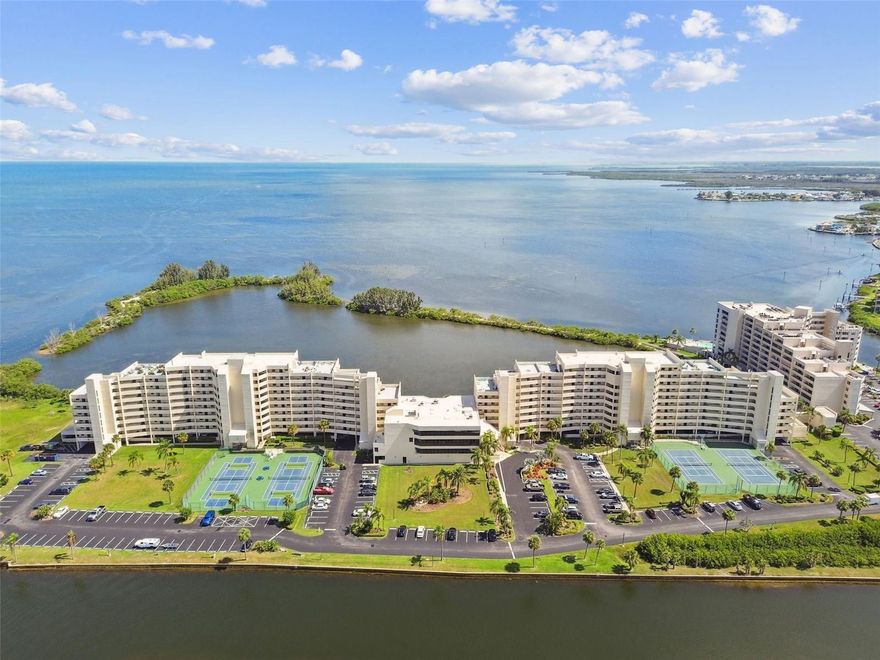 Welcome to Paradise! Stunning remodeled 1st floor condo on the Gulf of Mexico is beautifully designed with new furniture, new appliances, new washer/dryer, and new bathrooms. Designer features include: Stainless steel appliances, granite and shaker style cabinets in the kitchen, continuous laminate flooring throughout, beautifully tiled master walk in shower, updated vanities, updated and modern lightning, custom built-in wardrobe in the 2nd bedroom, hurricane impact sliders, and a cabinet murphy bed in the living room. This condo is being sold fully furnished and ready to move in!

Gulf Island Beach and Tennis Club Complex is a resort-style community offering a private beach, heated swimming pool just steps from the unit, barbecue facilities, tennis courts, and clubhouse. Association fee includes water, trash, Spectrum cable TV and in-unit WiFi. Community Features: 24hr Guard, Heated Olympic sized pool, clubhouse, game room and fitness center, tennis/pickleball courts, private beach, lagoon, BBQ areas & nature trail! Access to community workshop with drill press, table saw, benches, etc. 

Gulf Island Beach & Tennis Club is truly the hidden GEM of Pasco County, this community offers residents and owners an active waterfront lifestyle. Community has undergone many improvements within the last 4 years, new breezeway flooring, new elevators, roof improvements, new pool liner, new pool furniture, new carpet in the clubhouse, and repaved parking lots.
