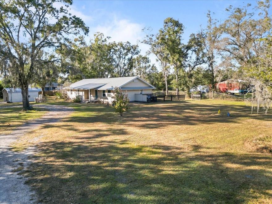 **Experience true country living with the convenience of city access.** This fully fenced property in the rural heart of Plant City offers a rare combination of privacy, space, and freedom with **NO HOA or CDD**. Situated on an oversized lot surrounded by large parcels, this home is ideal for families, business owners, outdoor enthusiasts, and anyone seeking open land and unrestricted use.

Enjoy ample room for **work vehicles, trailers, boats, RVs, campers, side-by-sides, equipment, and hobby projects**. The flat, usable land allows for gardens, workshops, additional storage buildings, or future expansion. Animal lovers will appreciate the space for **dogs, livestock, and pets to roam freely**.

Inside, the home provides comfortable living, while the exterior delivers the safety and openness that rural buyers seek. The entire property is **fully fenced**, offering both security and peace of mind.

Conveniently located near **I-4 and Hwy 60**, this property provides quick access to Tampa, Brandon, Lakeland, and Orlando. Local favorites like **Keel & Curley Winery/Keel Farms**, fresh produce markets, equestrian facilities, and Plant City’s shops and restaurants are just minutes away.

If you're searching for a spacious, versatile property with unlimited potential — all within an easy commute to major cities — this is the perfect fit. Country living, uncompromised convenience, and room to grow await at 4805 Cooper Rd.