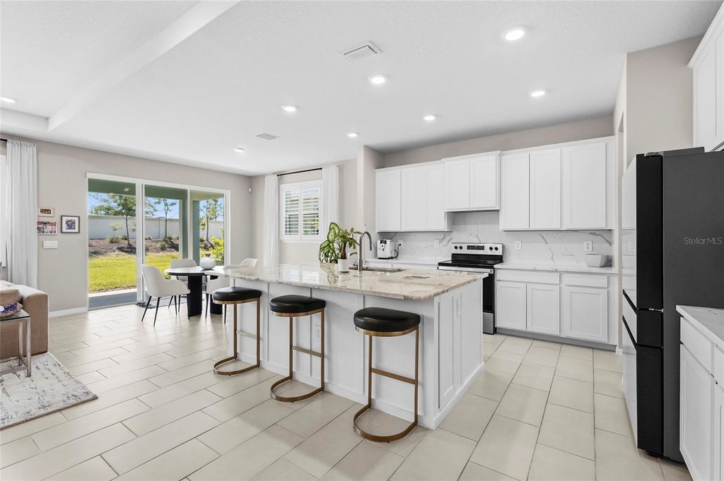 Photo of 5715 Woodland Sage Drive, Sarasota, FL 34238 (MLS # A4689452)