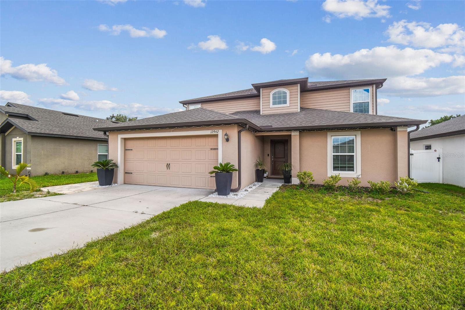 Welcome to this move-in-ready 5-bedroom, 2.5-bathroom, POOL home located in the gated community of Sand Ridge in Spring Hill! This spacious and well-maintained property offers a thoughtful layout designed for comfort, privacy, and entertainment. The first floor features an open living area with tile flooring throughout the living space, creating a seamless flow between the living room, dining area, and kitchen. The primary suite is conveniently located downstairs, offering a spacious retreat with an en-suite bathroom and a walk-in closet. A den/office is located on the first floor, as well as a half bath for guests. Upstairs, you’ll find four additional bedrooms, a full bathroom with double sinks, and a generous bonus room—ideal for a media room, playroom, or secondary living space. Step outside and enjoy your own backyard paradise! The recently installed saltwater pool and expansive paver lanai make this home an entertainer’s dream, while the absence of rear neighbors ensures added privacy. Conveniently located near the Suncoast Parkway for an easy commute to Tampa and the surrounding areas. Pool maintenance is included in the rent price. Don’t miss the opportunity to lease this exceptional home—schedule your private showing today!