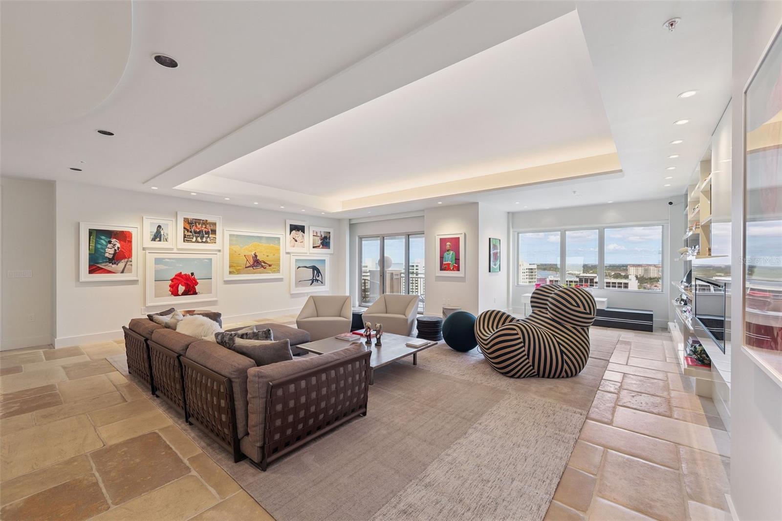 Welcome to unit #1704 at The ultimate Penthouse in The Residences at The Ritz-Carlton Sarasota the pinnacle of ultra-luxury lifestyle living. Spanning nearly 5,000 square feet, this extraordinary three-bedroom residence offers a seamless blend of elegance, comfort, and breathtaking panoramas.
From every room, you’re greeted with uninterrupted water views that create a sense of serenity and connection to Sarasota’s coastal beauty. Nearly 360 degrees of vistas capture the best of Sarasota, sunrises over the Bay, sparkling Gulf waters, and the vibrant cityscape. With exposures to the south, west, and north, the light and scenery are ever-changing, ensuring each moment feels unique.
Unlike typical condominium living, this home provides an expansive layout designed for both grand entertaining and private retreat, offering the rare gift of space. The flow between living, dining, and relaxation areas feels open yet intimate, crafted to elevate every aspect of daily living.
As a resident, you’ll enjoy access to unmatched, exclusive amenities synonymous with the Ritz-Carlton brand, personalized services, resort-style facilities, and the security of a world-class lifestyle. Additional features include two secure parking spaces, private terraces, and floor-to-ceiling windows framing panoramic city and water views.
This is more than a home, it’s a lifestyle, where every detail embodies sophistication, exclusivity, and comfort.