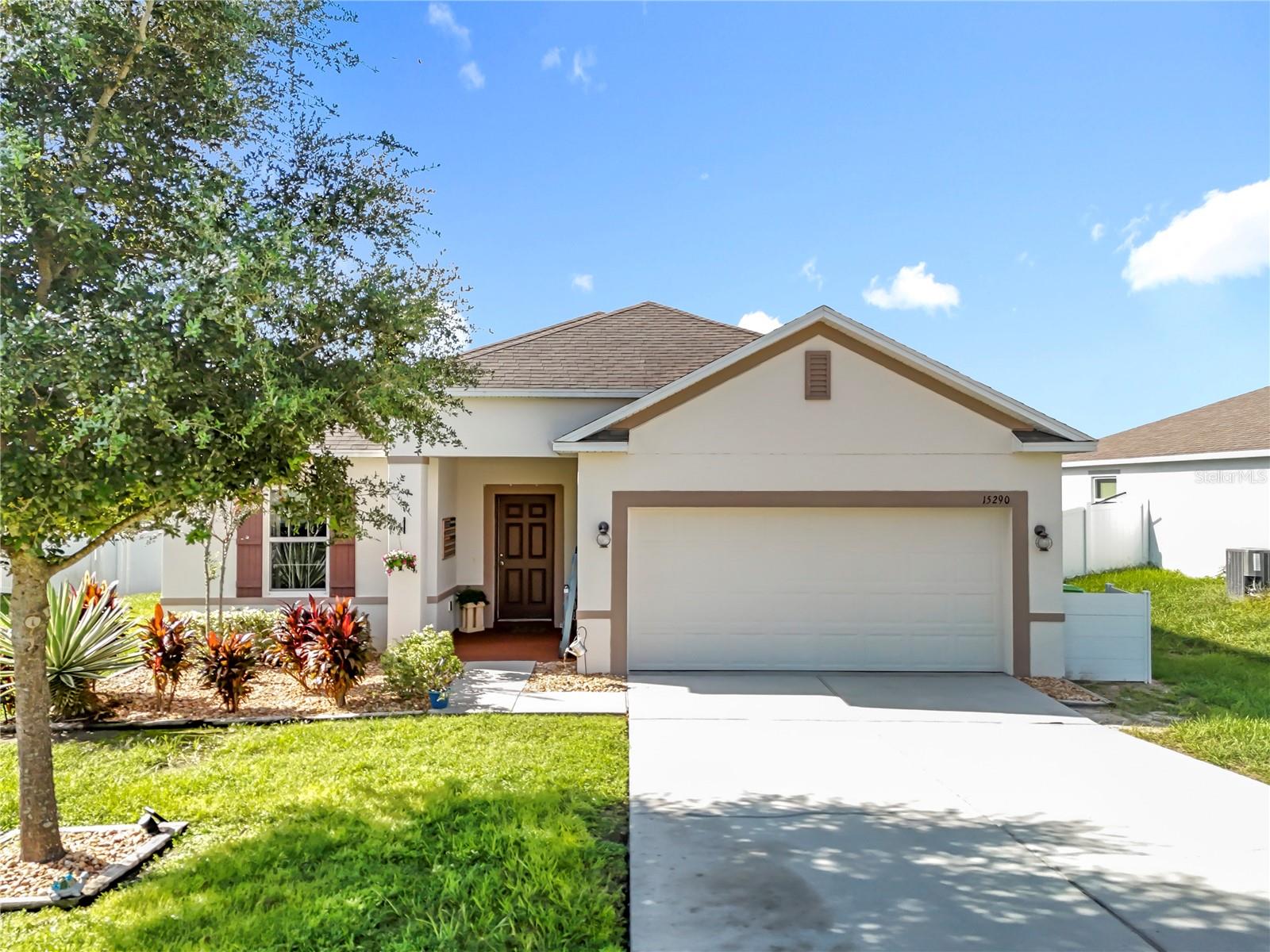Welcome to a 2019 build with the right layout. The great room opens to an eat-in kitchen with 42-inch cabinetry and solid-surface tops(Granite). A private primary suite, two comfortable secondary bedrooms, and a flexible den give you space to live and work. Ceramic tile in high-traffic areas keeps maintenance low.Premium Vinyl flooring in all bedrooms. All major appliances convey, including stainless kitchen package, refrigerator, washer, and dryer. Step outside to a 10×20 patio and fenced back yard. Two-car garage. Low annual HOA in Knight Lake Estates. Easy access to Clermont, US-27, and all the local theme parks.