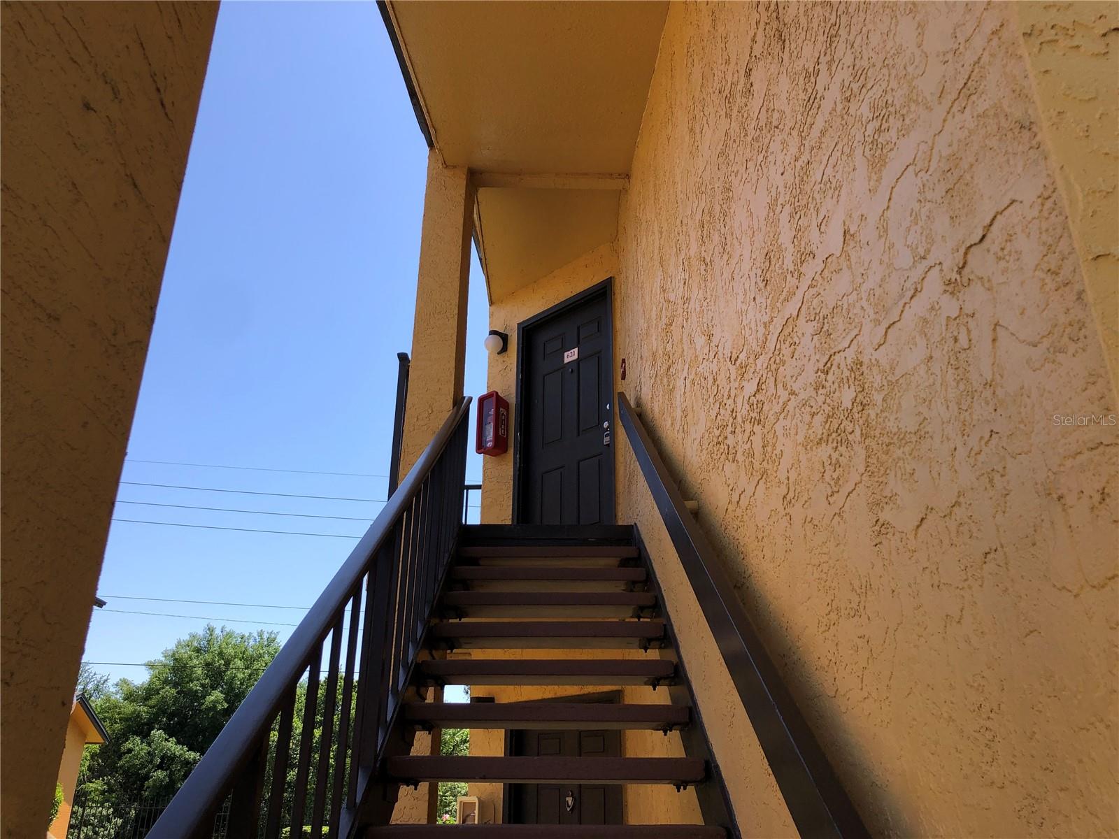 Gated community. Second floor end unit. Lots of sunshine. Stainless steel appliances in kitchen. Laminate floors throughout. Two bedrooms, one bathroom. Amenities include pool, tennis, health club, racquetball. Washer and dryer hookups located in interior laundry closet. Great location just 9 minutes from Orlando International Airport with easy access to 408 and 528 highways.