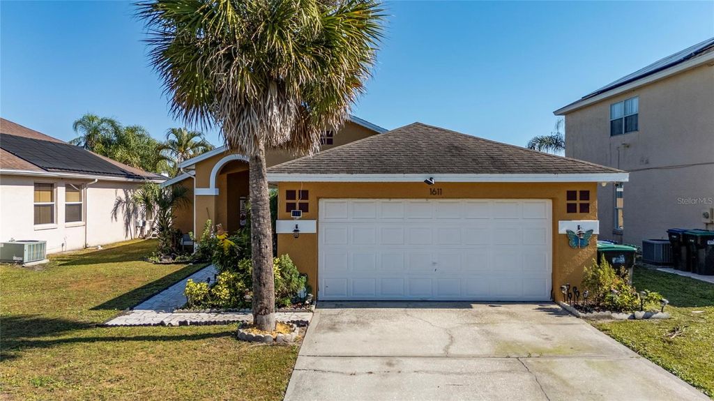 Photo of 1611 Bridgeview Circle, Orlando, FL 32824 (MLS # O6362961)