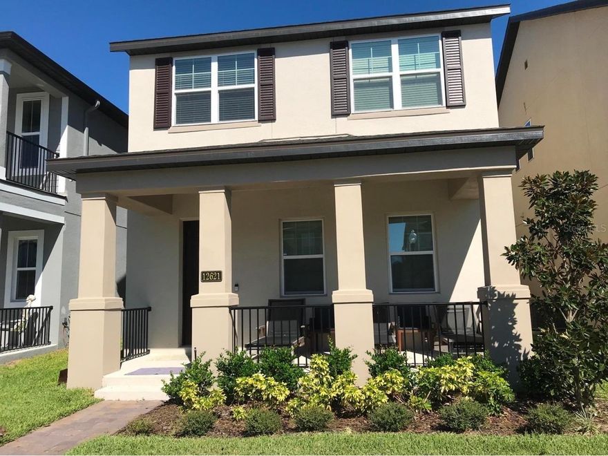 Welcome to this move-in ready home in sought-after Westside Village, offering a FLEXIBLE FLOOR PLAN and SEPARATE 1-BEDROOM IN-LAW SUITE above the garage — perfect for guests, rental income, or multi-generational living. The main home up front offers 3 bedrooms plus a versatile loft room—ideal as an office, playroom, or media space—anchored by an open great room and a granite-island kitchen with walk-in pantry, solid wood cabinetry, and stainless appliances. Out back, the private 1BR/1BA garage apartment (separate entry) adds real flexibility for multi-generational living, long-term rental income, or a dedicated guest/office suite—with its own living area, kitchenette, and walk-in closet. Community pool & clubhouse; minutes to Publix and Lakeside Village dining, with easy Disney access (area often enjoys evening fireworks views, conditions permitting). Exceptionally attractive $/SF versus nearby listings—especially for a home with an income-capable apartment. Tour today.