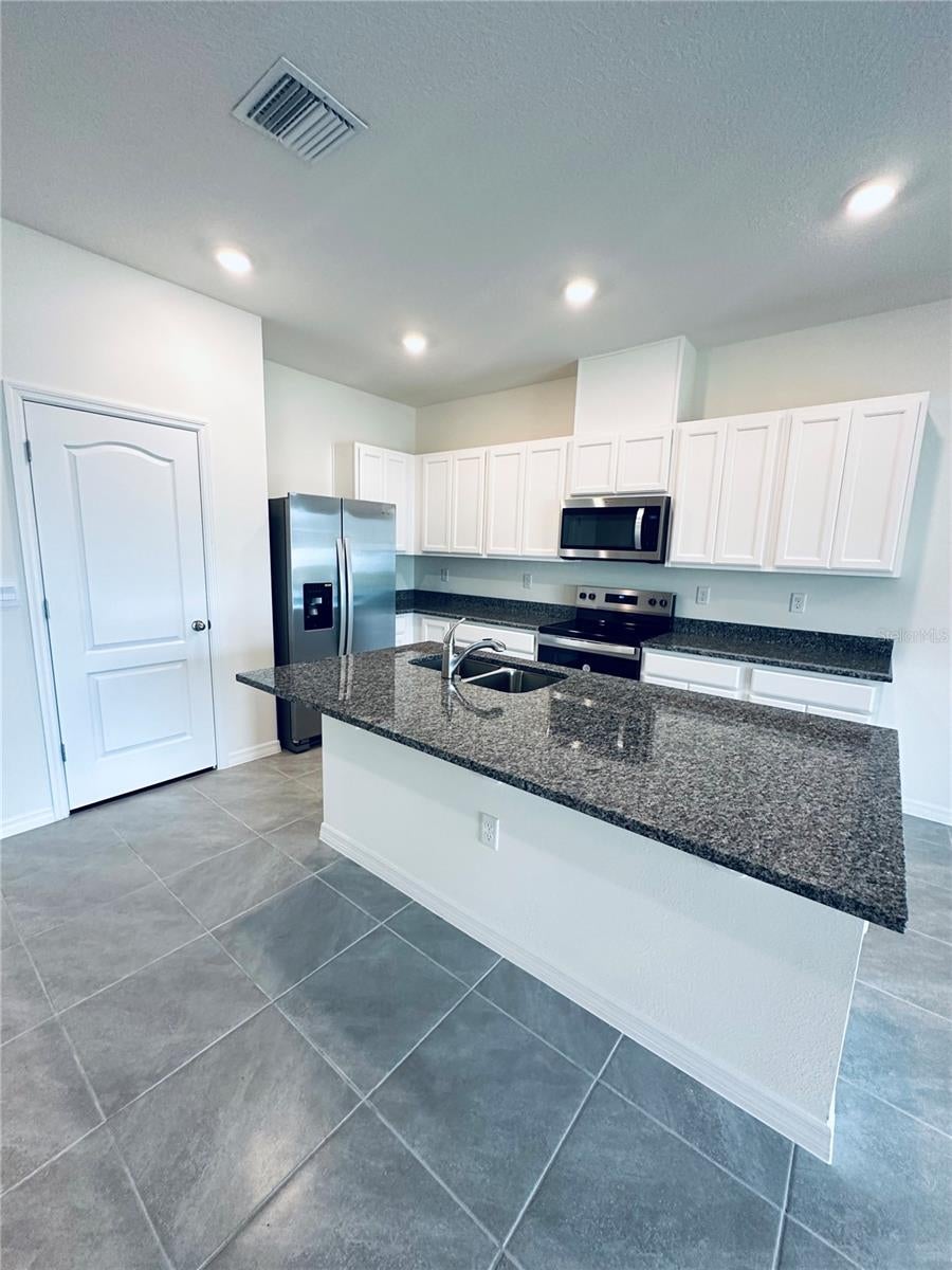Photo of 1232 Draintree Street, Davenport, FL 33837 (MLS # S5156643)