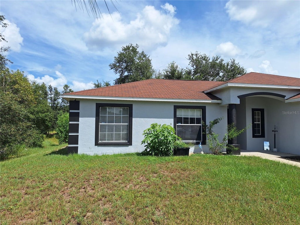 Photo of 327 Puffer Court, Poinciana, FL 34759 (MLS # O6436298)