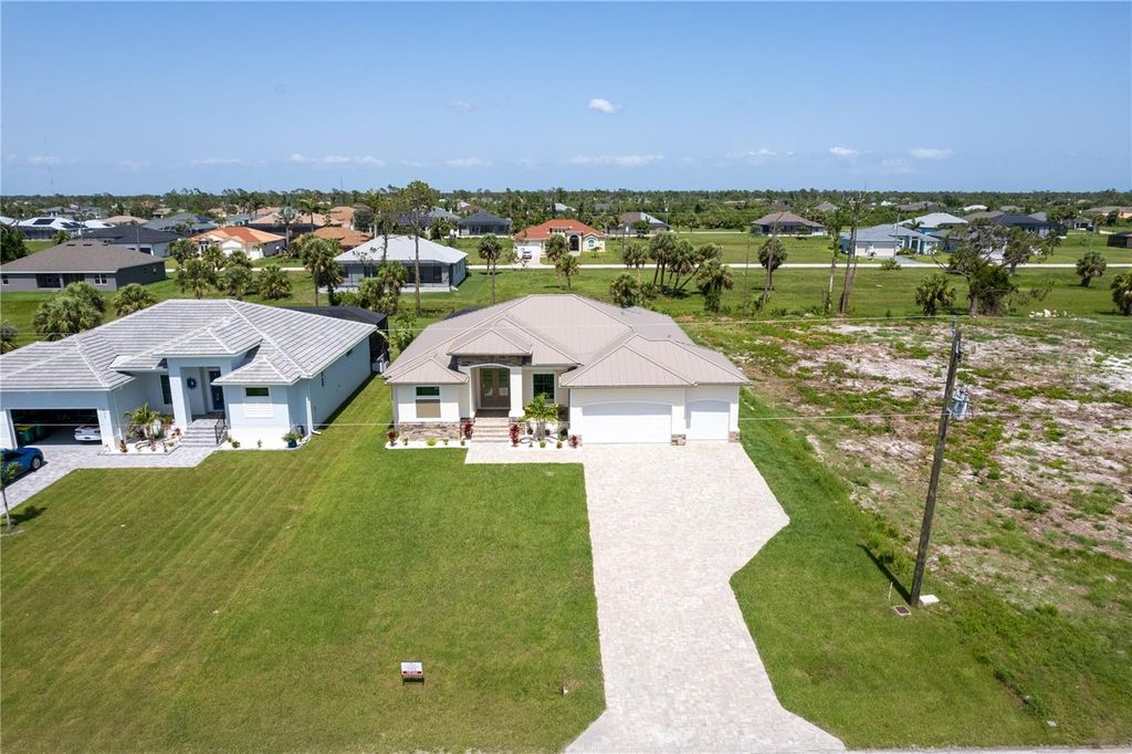 Photo of 235 Rotonda Boulevard S, Rotonda West, FL 33947 (MLS # O6395050)