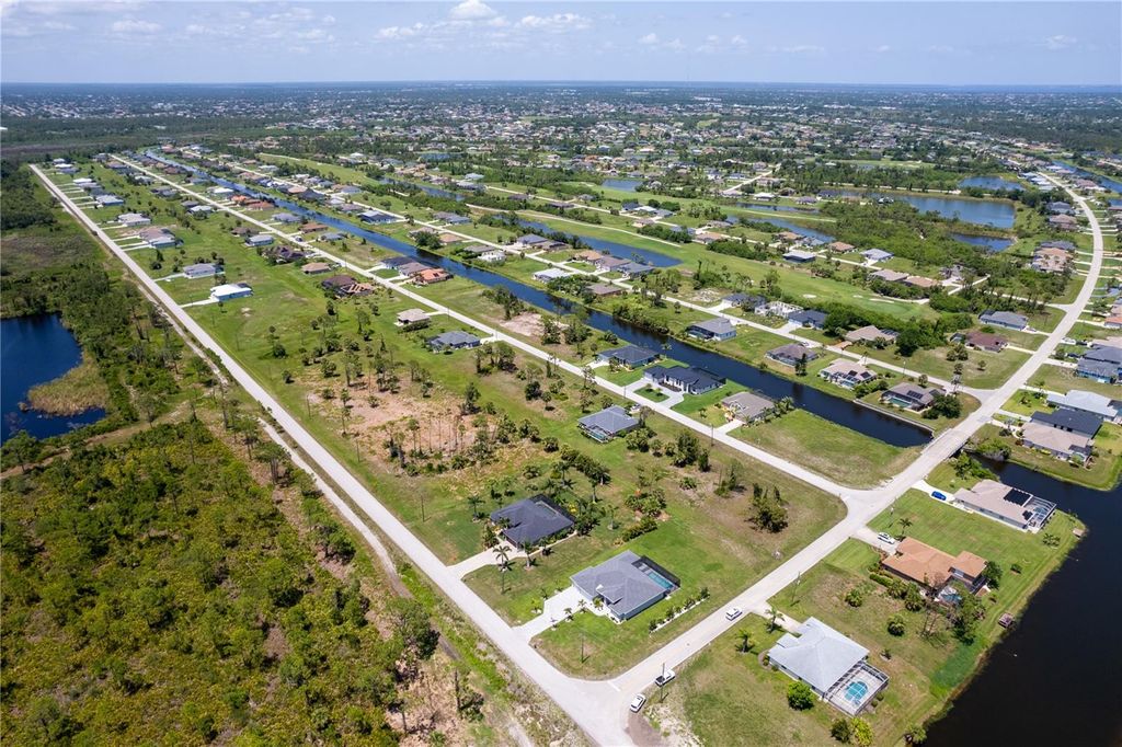 Photo of 235 Rotonda Boulevard S, Rotonda West, FL 33947 (MLS # O6395050)