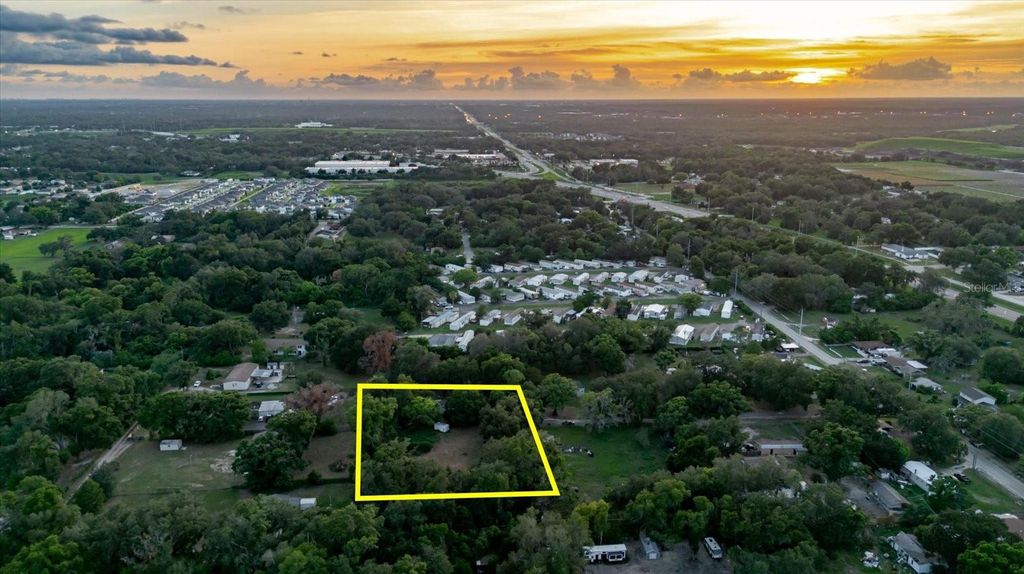 Photo of 11152 Galaxy Lane, Thonotosassa, FL 33592 (MLS # TB8521061)