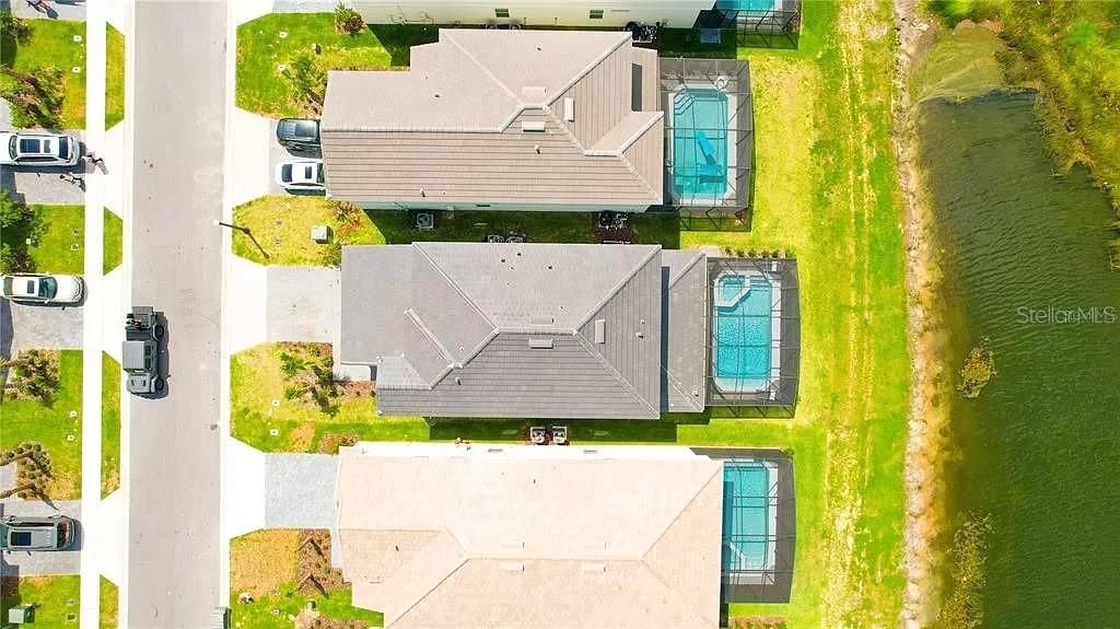 Photo of 7243 Oakmoss Loop, Davenport, FL 33837 (MLS # O6422329)