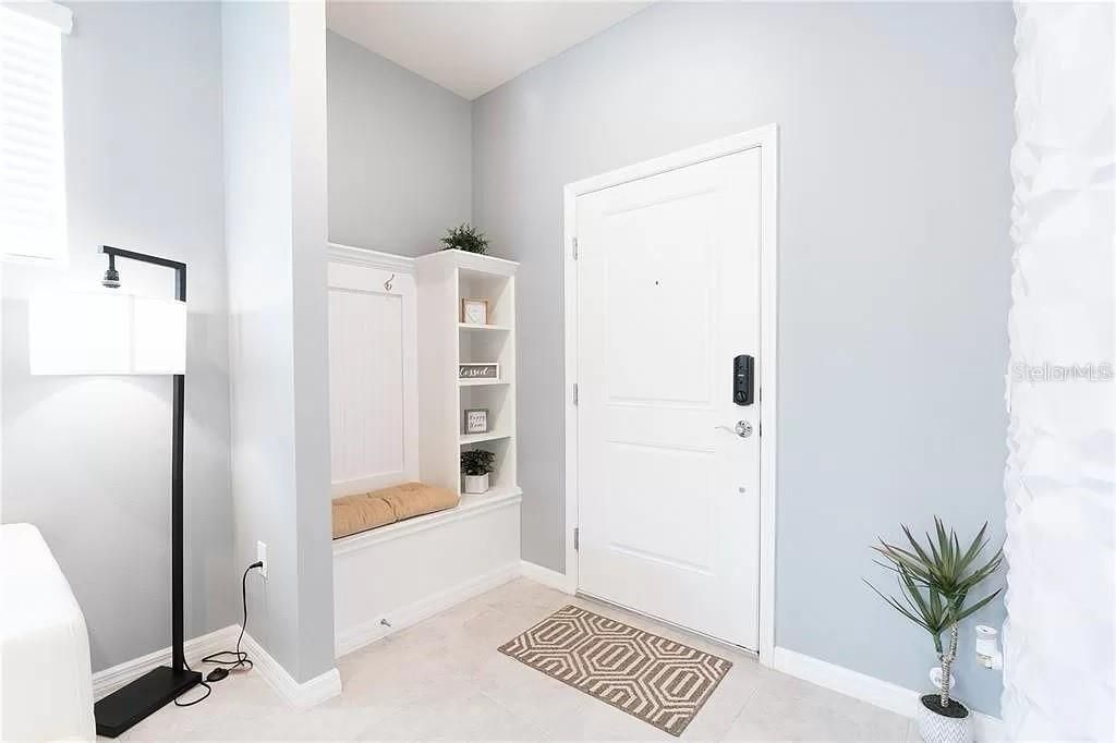 Photo of 7243 Oakmoss Loop, Davenport, FL 33837 (MLS # O6422329)