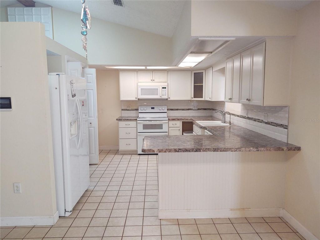 Photo of 7841 Lightfoot Drive, New Port Richey, FL 34653 (MLS # TB8411485)