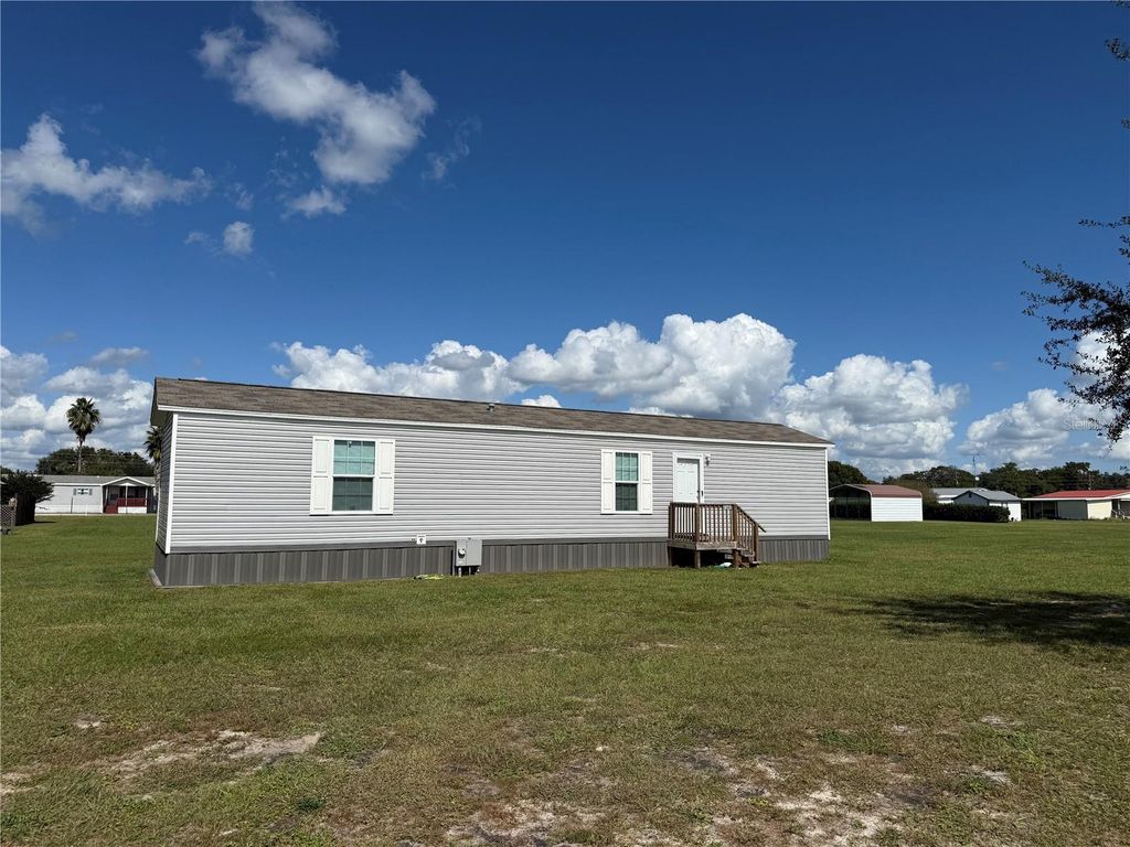 Photo of 1141 NW 12th Ln, Lake Panasoffkee, FL 33538 (MLS # G5103589)