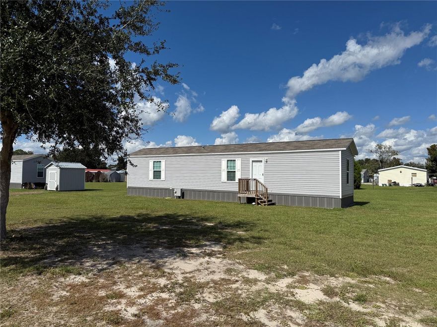 Welcome home to this 2 bedroom 2 bath single wide manufactured home on an oversized lot in desirable Montgomery Acres. Located a short distance from I-75 making north and south travel a breeze. Also approximately 15 minutes from The Villages providing shopping, dining, and nightly entertainment. For the outdoor enthusiast please note there are several WMAs near by and several public boat ramps providing access to beautiful Lake Panasoffkee and the Withlacoochee river.
