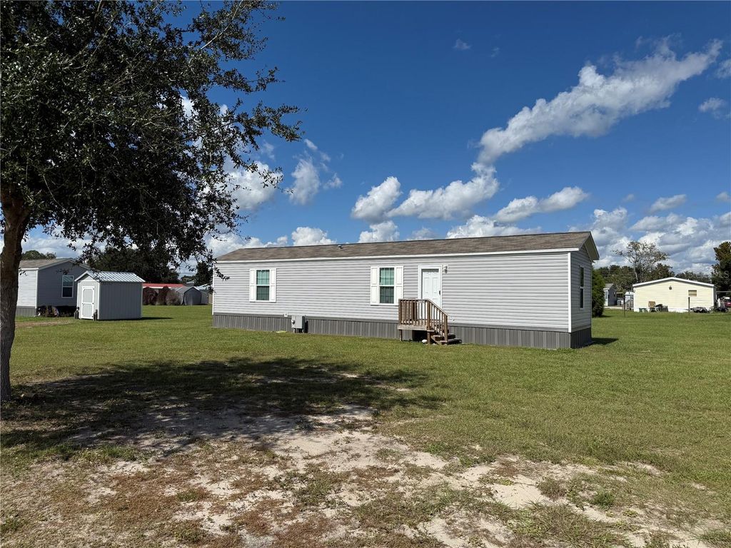 Photo of 1141 NW 12th Ln, Lake Panasoffkee, FL 33538 (MLS # G5103589)