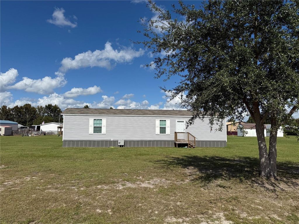 Photo of 1141 NW 12th Ln, Lake Panasoffkee, FL 33538 (MLS # G5103589)