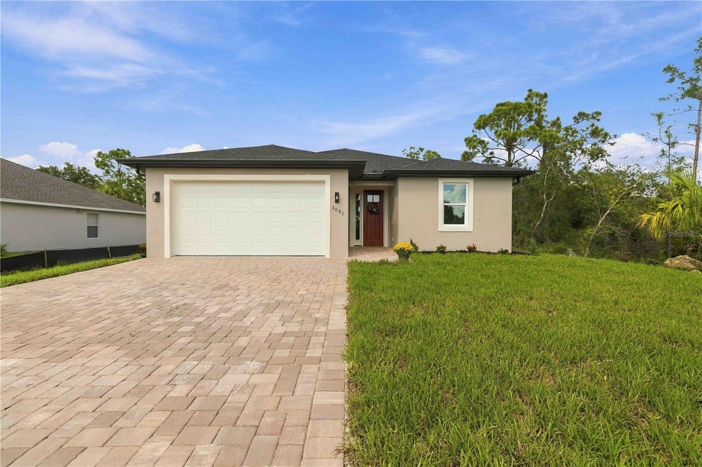 Photo of 1631 Lace Terrace, Port Charlotte, FL 33953 (MLS # N6146220)