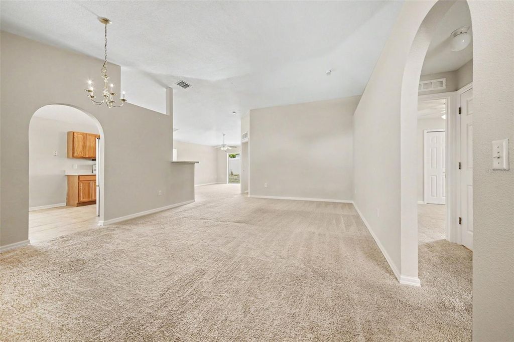 Photo of 2122 Aitkin Loop, Leesburg, FL 34748 (MLS # O6424664)