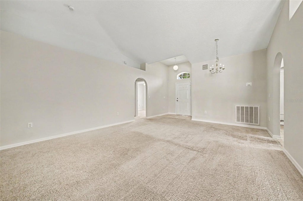 Photo of 2122 Aitkin Loop, Leesburg, FL 34748 (MLS # O6424664)