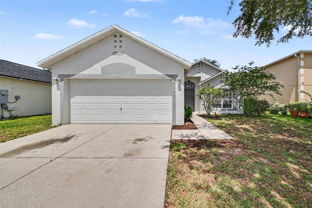 Photo of 2122 Aitkin Loop, Leesburg, FL 34748 (MLS # O6424664)