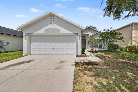 Photo of 2122 Aitkin Loop, Leesburg, FL 34748 (MLS # O6424664)